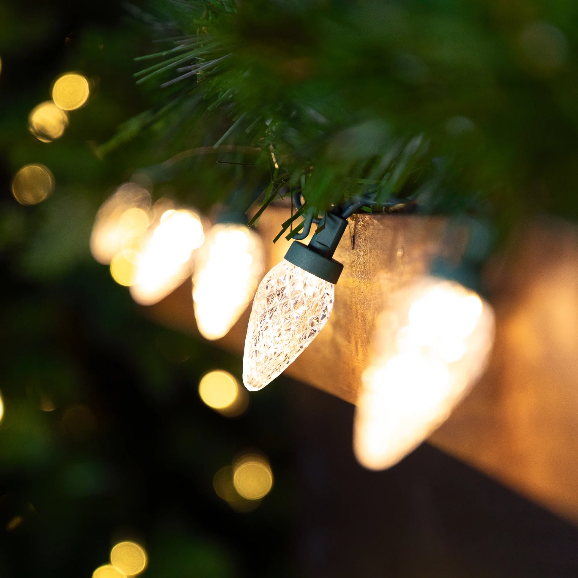 LED Faceted C9 Christmas Lights - Warm White - 66' Green Wire - 100Ct
